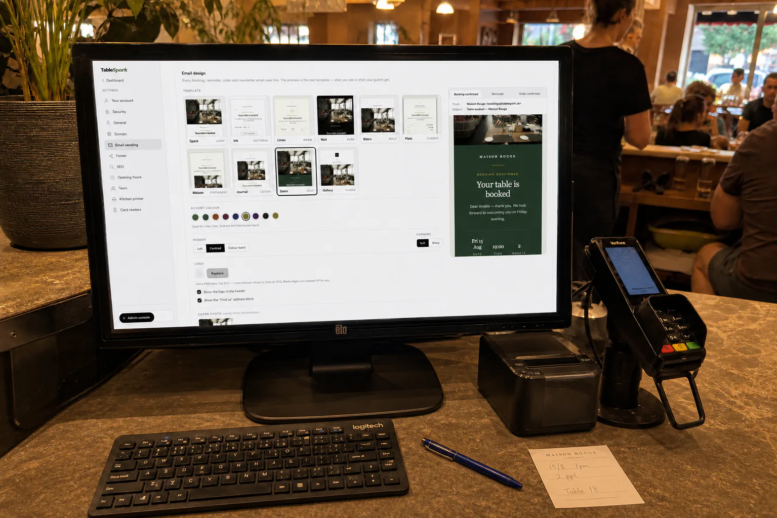 A restaurant till computer showing TableSpark management tools
