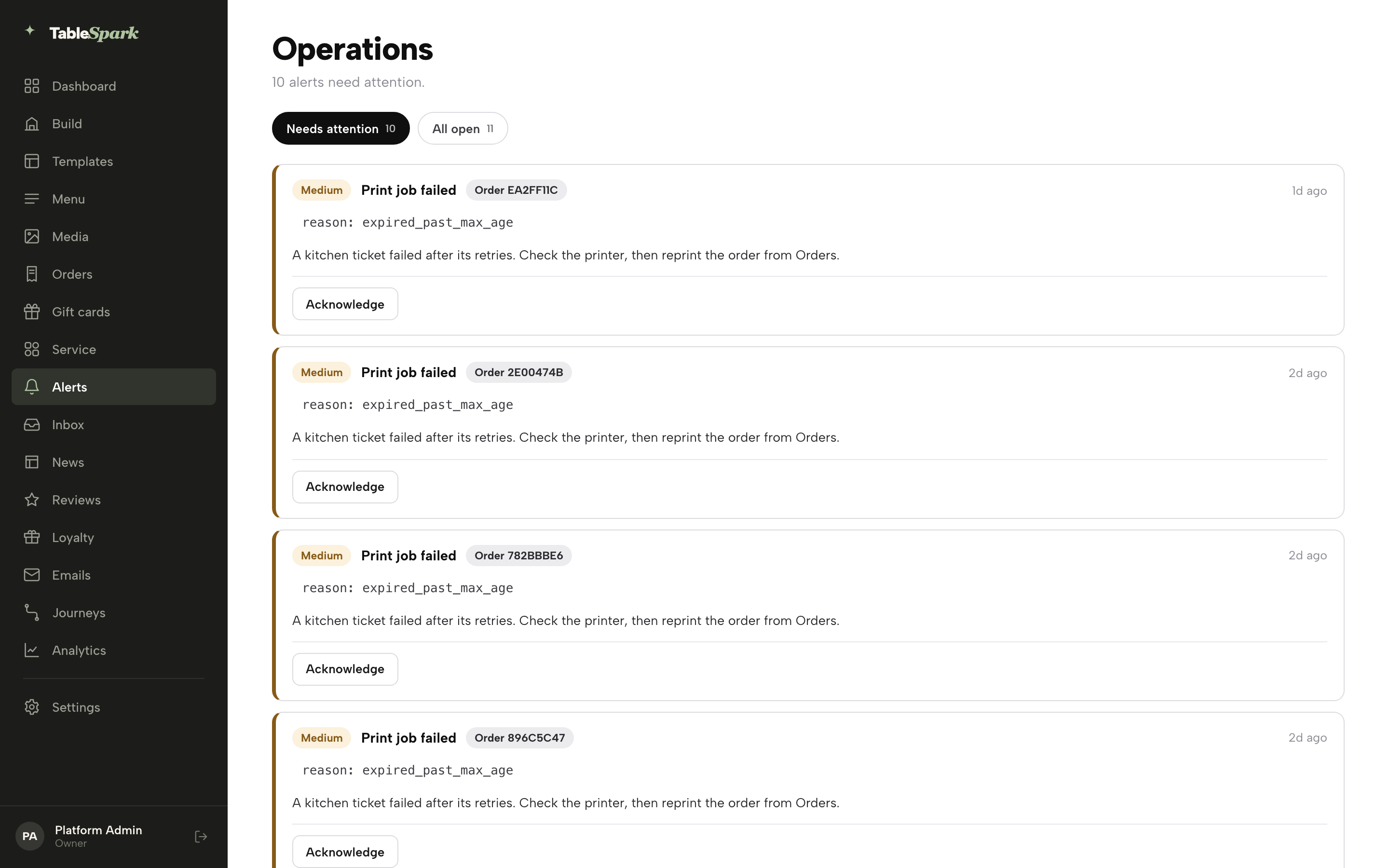The Operations (Alerts) page: Needs attention and All open tabs, and a list of Print job failed alert cards each with an order reference, a plain-English explanation, and an Acknowledge button